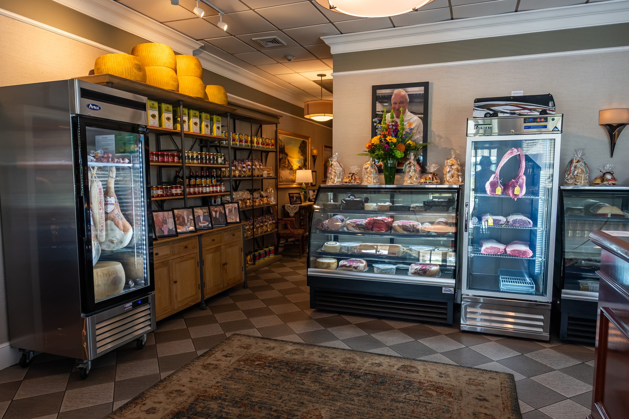 The Italian market counter inside Luciano’s, with cheeses and cured meats