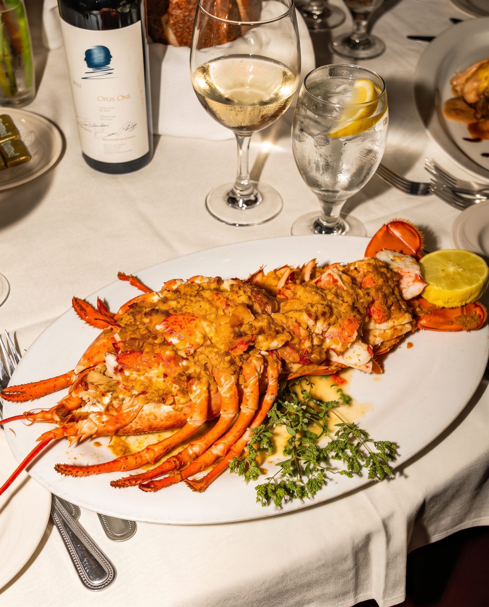 A baked stuffed lobster served whole at Luciano’s